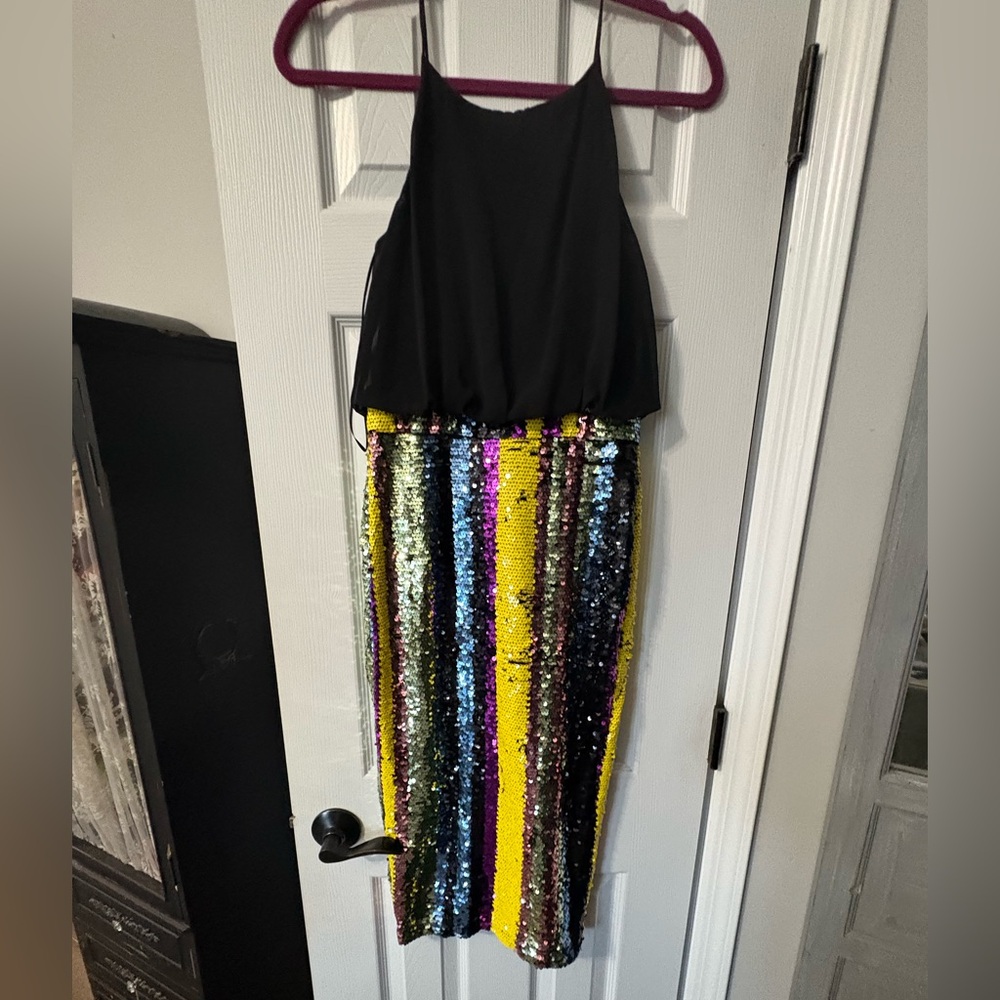 Traffic People Black Dress with colored sequence detail.